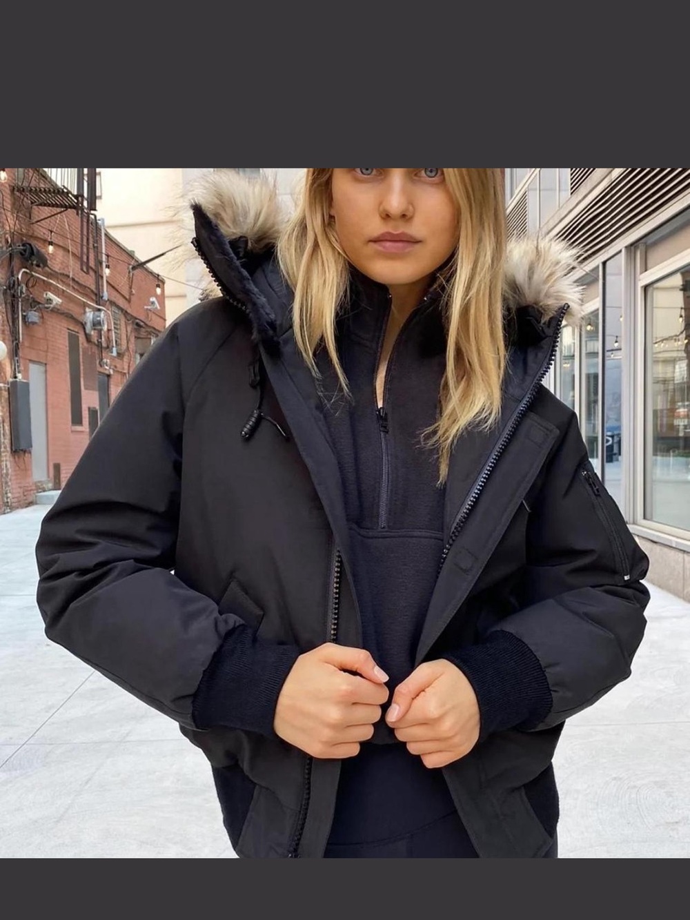 Aritzia Black Bomber Jacket with Faux Fur Hood Trim